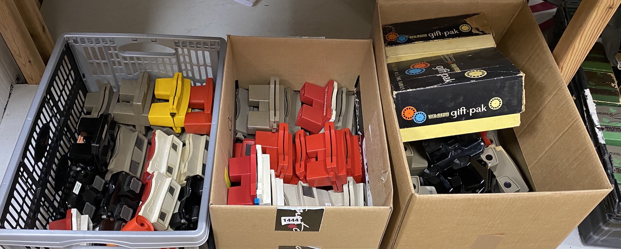 Three boxes of View-Master viewers, 1950s-1980s, including tow model C with light attachments, and two empty gift-pak boxes